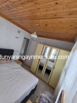 DALYAN İZTUZU PLAJ YOLUNDA EŞYALI BAHÇELİ 2+1 KİRALIK DAİRE