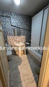 KALAMIŞ SAHİLDE İŞ YERİNE UYGUN KİRALIK 2+1 DAİRE